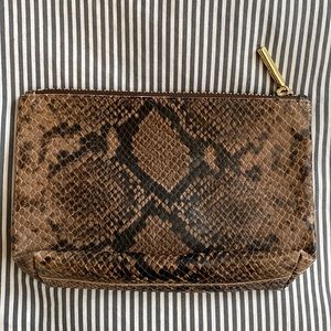 cuyana mini leather zip pouch in “brown snake”